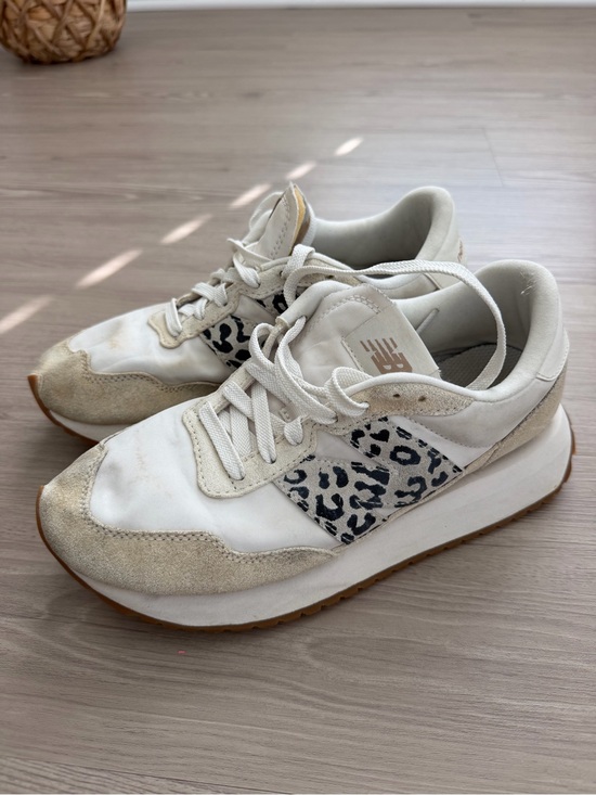 New Balance Shoes - New Balance Women’s Cream and White Sneakers with Leopard Accent